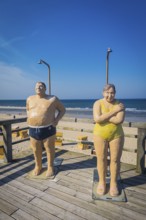 Figures under the shower, beach, bathing, showering, summer holiday, summer, sea, tourism, symbol,