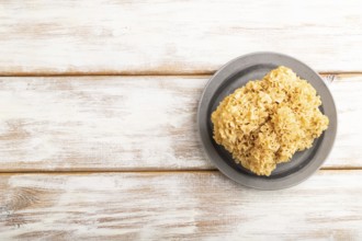 Raw Sparassis (Cauliflower Mushroom) on white wooden background. Top view, flat lay, copy space