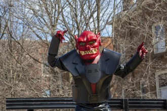 Detroit, Michigan, The Marche du Nain Rouge celebrates the coming of spring and banishes the Nain