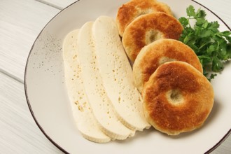 Mchadi, corn tortillas, traditional Georgian dish, corn bread, with Imeretian cheese, homemade, no