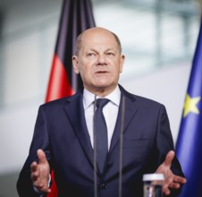 Olaf Scholz, Federal Chancellor, speaks at a press conference during the visit of Denis Becirovic,