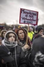 150, 000 people gather around the Bundestag in Berlin to build a human wall against the shift to