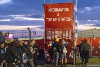 Adenau, Germany, 8 June 2024: Charging station for the cashless payment system at the Rock am Ring