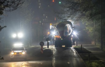 Transport of a 68 metre long, 22 tonne blade of a wind turbine, here in Breckerfeld, with a