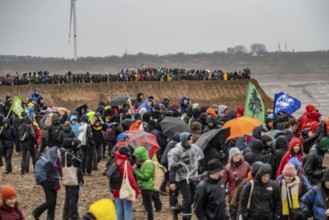 Many thousands of demonstrators march after a demonstration against the demolition of the lignite