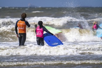 Course for surfers, surfing beginners, on the beach of Scheveningen, Netherlands