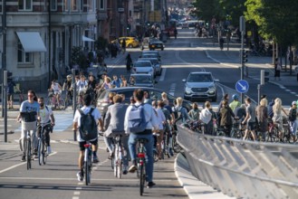 Cyclists on cycle paths, on Vester Voldgade Street, Lille Langebro Bridge, in the city centre of