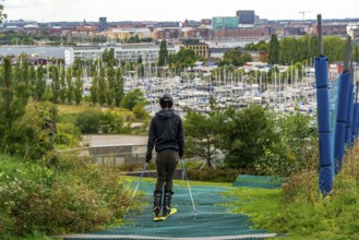 CopenHill, waste incineration plant and artificial ski slope, skiing with a view of Margretheholms