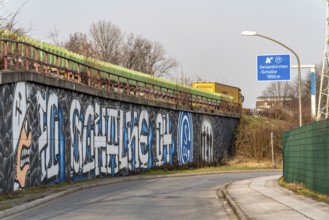 Large-format mural, graffiti, of the Schalke fan scene, below the A42 motorway,