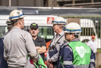 Steelworkers at a demonstration in front of the headquarters of ThyssenKrupp Steel Europe in