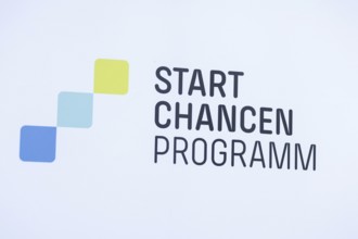 Logo of the Startchancen programme, taken during a press conference on the signing of the