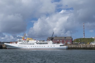 Seaside resort ship Funny Girl at the quay in the inland harbour, offshore island of Heligoland,