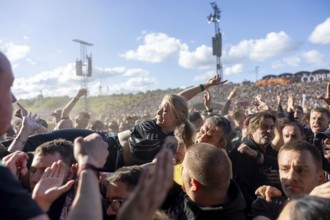 Copenhagen, Denmark - 19.6.2024: Festivalgoers crowdsurfing at the Copenhell Metal Festival at