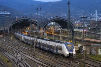 The main railway station of Hagen, station halls, tracks, platforms, regional express train of