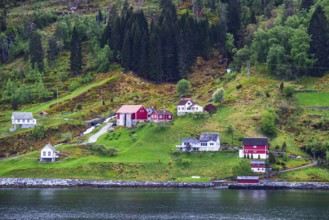 Mountains and Fiord over Norwegian Village in Olden, Innvikfjorden, Norway, Europe