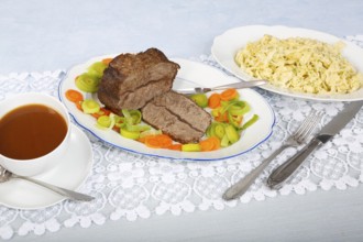 Swabian cuisine, roast beef, roast ox, herb spaetzle, meat dish, gravy, carrot vegetables, leek,