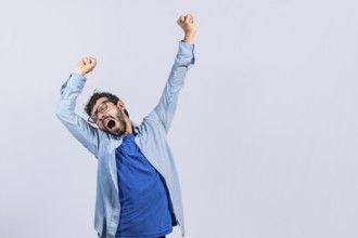 Beard man yawning and stretching his hands isolated. Sleepy man stretching hands isolated