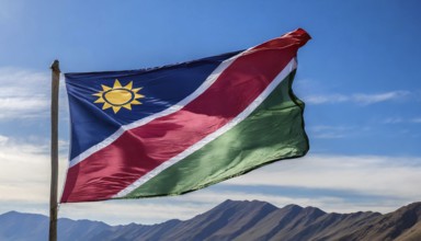 Flags, the national flag of Namibia flutters in the wind