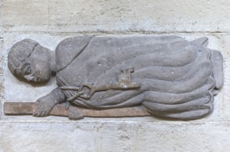 Horizontal relief sculpture of the monk Rydan with key, Schottenkirche St Jakob, Regensbnurg, Upper