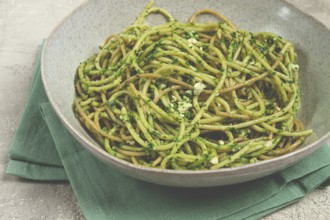 Spaghetti with pesto sauce, homemade, no people