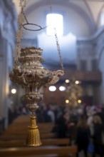 Lamp Hanging with Window Light Inside the Church of San Nazzaro (Croglio) in Castelrotto, Ticino,