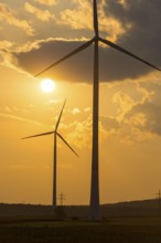 Wind farm, wind turbine, wind turbines, in front of sunset, storm clouds, Swabian Alb,