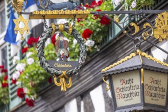 Nose sign in the old town centre of Bamberg. Brewer's star, guild symbol of the brewers.