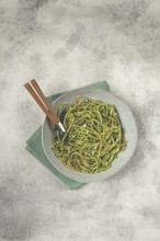 Spaghetti with pesto sauce, homemade, no people