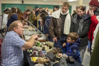 Detroit, Michigan - A teacher explains rocks and minerals to visitors at Wayne State University's