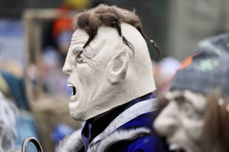 Person dressed up as a goth at the Wey guild on Rose Monday, Güdismäntig, Lucerne Carnival 2024,