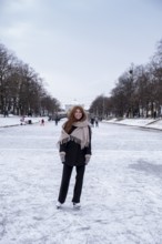 Ice skaters on the Nymphenburg Palace Canal, Nymphenburg in winter, Munich, Upper Bavaria, Bavaria,