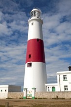 Red and white lighthouse on the coast at Portland Bill, Isle of Portland, Dorset, England, United