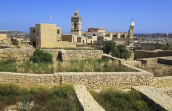 Cathedral church tower and ruins inside citadel castle walls Il-Kastell, Victoria Rabat, Gozo,