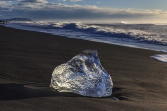 Ice floe on the beach, waves, sunny, morning mood, winter, Diamond Beach, Breidamerkursandur,