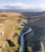 Mountain landscape with river in a narrow mountain valley in autumn, Little Naryn or Kichi-Naryn,