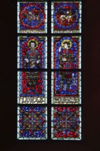 Colourful stained glass window with apostle Luke and Mark, evangelist, two, figures, biblical,