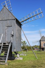 Three traditional historic windmills (Resmo väderkvarnar) in the village of Resmo on Öland, Kalmar