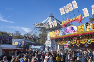 Crowd of people on fairground, amusement park, amusement ride, fairground rides, at the traditional