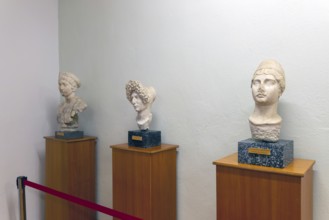 Carved marble Roman portraits head of three women, archaeology museum, Apollonia Archaeological