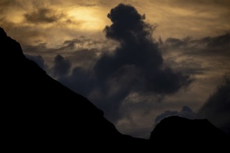 Summit in the morning light with dramatic clouds, Lech, Lechquellengebirge, Vorarlberg, Austria,