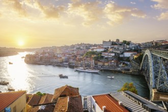 View of Porto city and Douro river and Dom Luis bridge I from famous tourist viewpoint Miradouro do