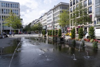 Schadowstraße in Düsseldorf, newly designed shopping street, pedestrian zone, many shops,