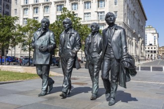 Statue of the Beatles in Liverpool, four famous bronze figures on the pavement, Liverpool