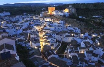 Easter procession at night through streets of Setenil de las Bodegas, Cadiz province, Spain, Europe