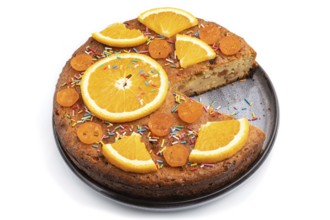 Orange cake isolated on a white background. Side view, close up