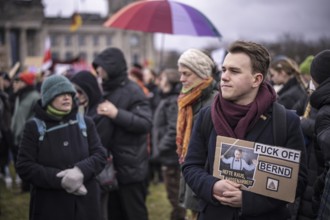 150, 000 people gather around the Bundestag in Berlin to build a human wall against the shift to