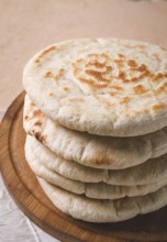 Pita bread, stack, on the table, no people