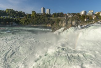 Rhine Falls seen from Schloss Laufen, rocky island, skyscrapers, rapids, spray, Canton Zurich, on