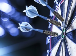 Darts hitting bullseye, concept of business success, successful decision making and precision, AI