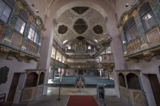 Interior with patronal boxes and organ loft, 1738 inauguration of the baroqueised town church of St